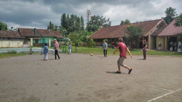 Playing football with Students